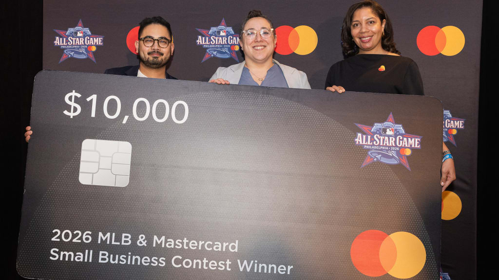 Shana Pistilli, winner of the 2026 MLB & Mastercard Small Business Contest, poses with Maverick Palabasan, MLB’s Senior Manager, Social Impact (left) and Amber Dawkins, Mastercard Vice President, Small Business Product Management. (Photo by Georgia Soares/MLB Photos via Getty Images)