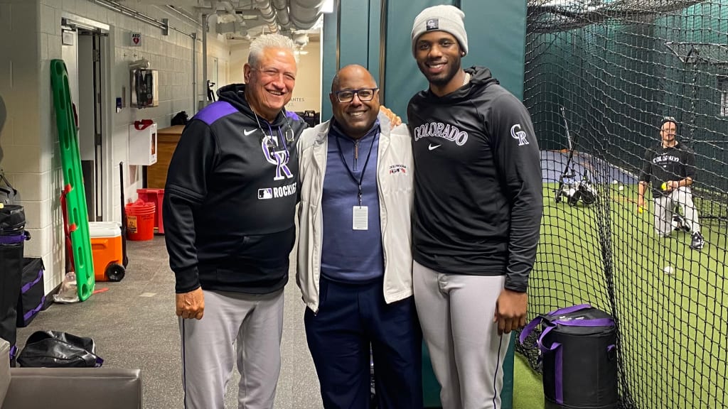 Nic Wilson (right) watches Rockies batting practice with Tyrone Brooks (middle) and Clint Hurdle (left). (photo via Tyrone Brooks)