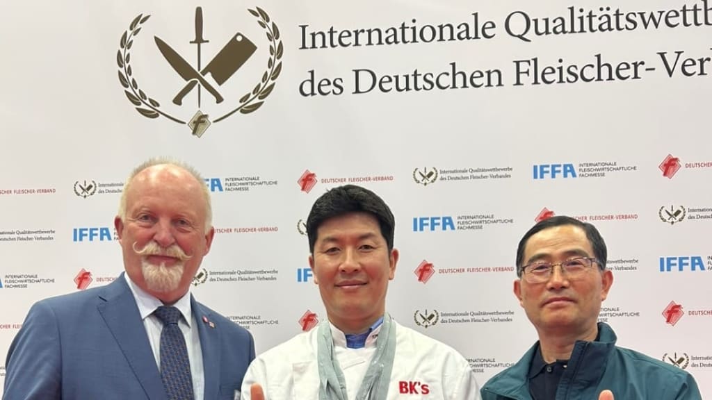 Kim with the medals he earned from the German Butchers' Association.