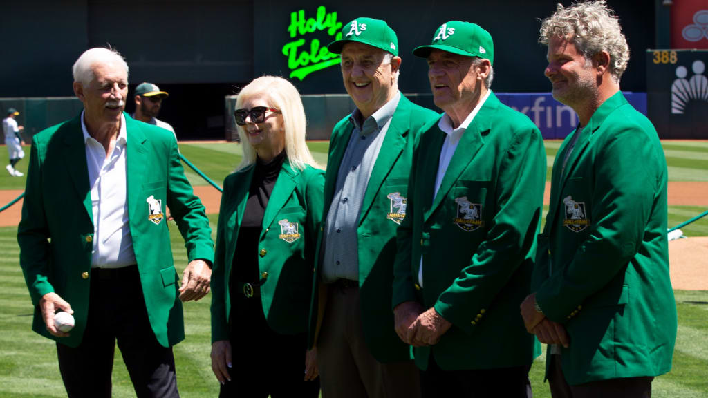 Joe Rudi, Carol Fosse, Steve Vucinich, Keith Lieppman and Sal Bando Jr. pose on Aug. 7 during the Oakland Athletics Hall of Fame ceremony. (AP Photo/D. Ross Cameron)