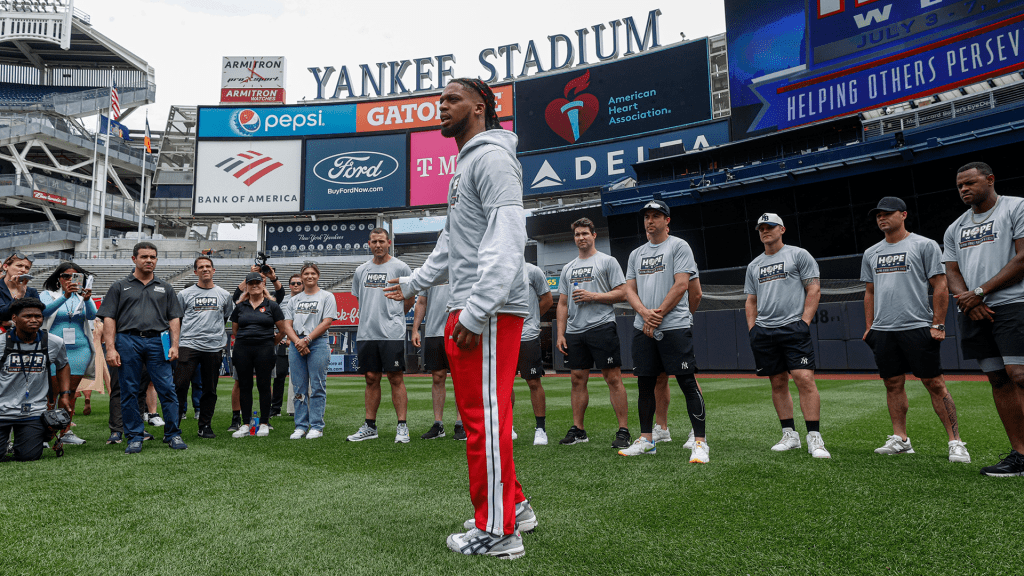 Damar Hamlin on the field at Yankee Stadium