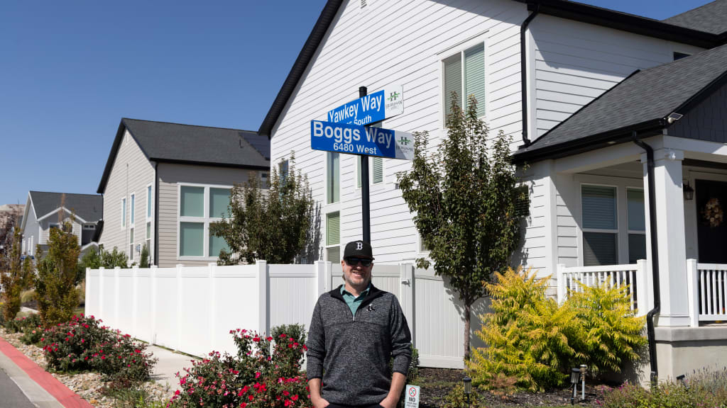 Brandon Parr stands at the intersection of Yawkey Way and Boggs Way ... in Utah.