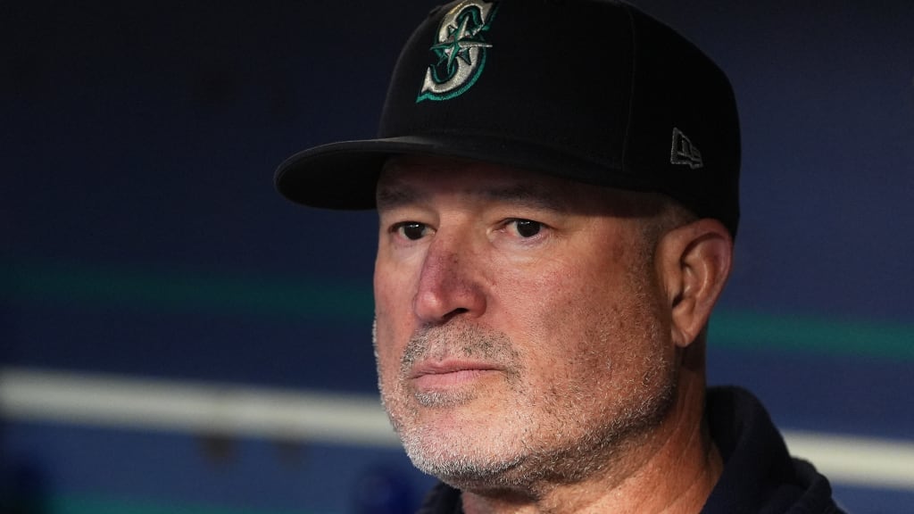 Manny Acta served two stints as the Mariners' bench coach and third-base coach. (AP)