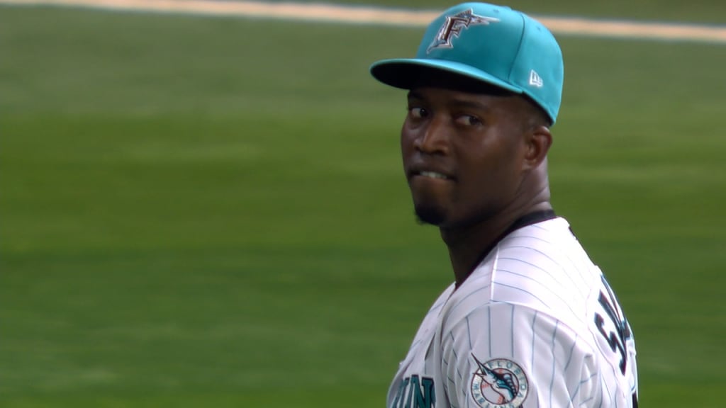 Miami Marlins' Jesus Sanchez, left, is congratulated by first base