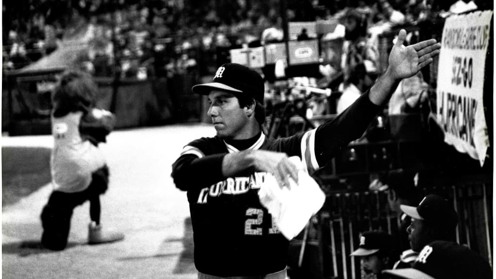 Dave Scott giving signs outside the dugout for Miami