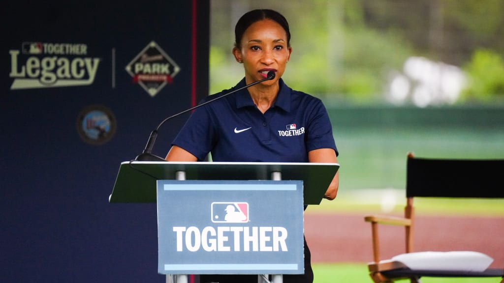 MLB Senior Vice President of Social Responsibility & Diversity April Brown speaks to the crowd during the field dedication ceremony at Willie Mays Park.