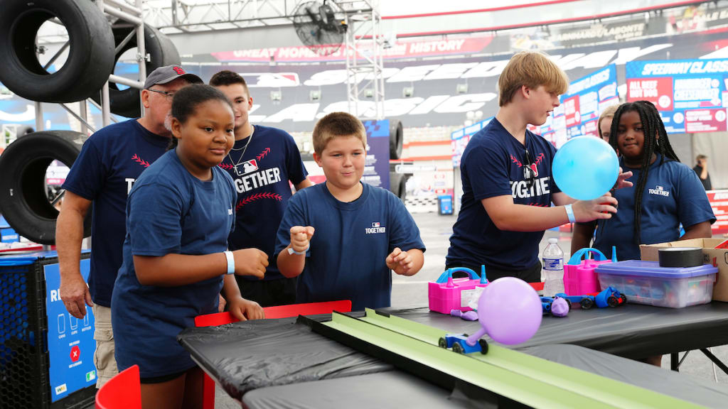 Participants take part in baseball-themed STEM activities before the Speedway Classic in Bristol, Tenn. (Mary DeCicco/MLB Photos)
