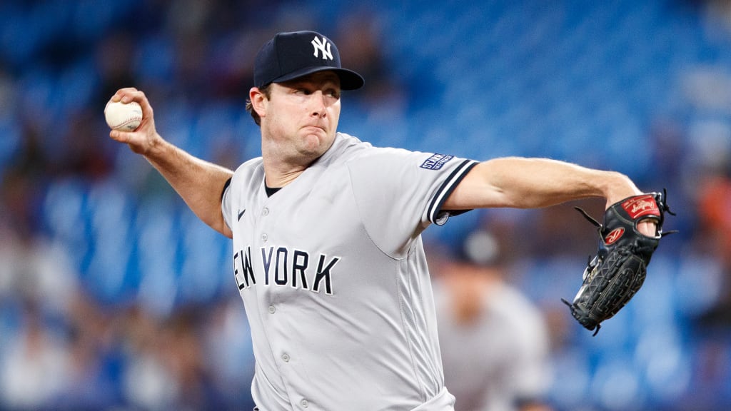 New York Yankees starting pitcher Gerrit Cole flips his hair back