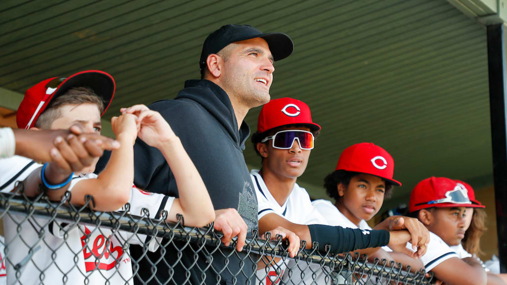 "“I don’t even think about it like volunteering," said Reds legend Joey Votto. "This is my community,”