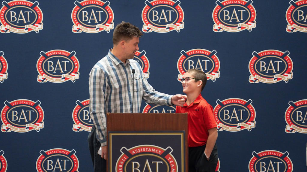 Andy Carter speaks about his son, Camden, during the B.A.T. Breakfast at the 2024 MLB Winter Meetings at Hilton Anatole on Wednesday in Dallas, Texas. (Daniel Shirey/MLB Photos via Getty Images)