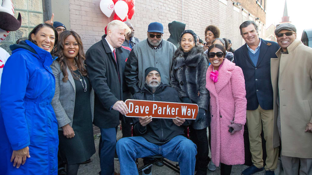 Among the crowd of well over 100 that were on hand to salute Dave Parker were other city officials, local dignitaries, former teachers, friends, local residents and fans.