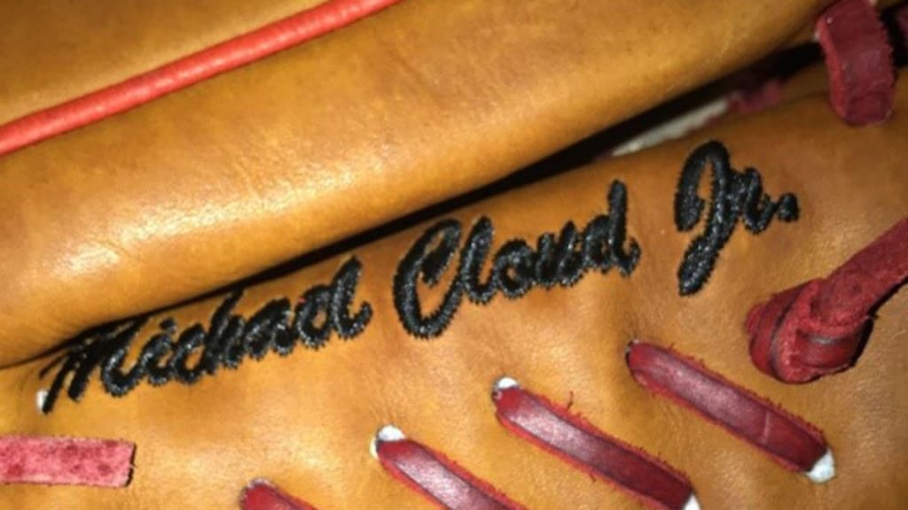 One of Michael Harris II's gloves with Michael Cloud’s name on it