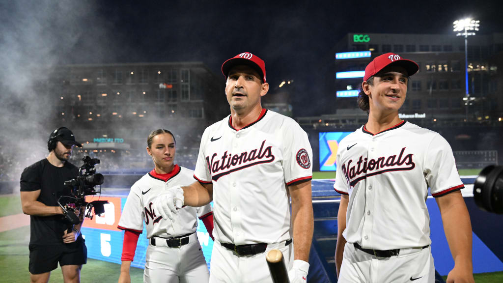Ali Newland, left, Ryan Zimmerman, and Chris McHugh after their HRDX championship.