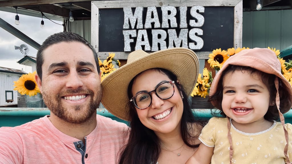 Juan Rodríguez with his wife and daughter.