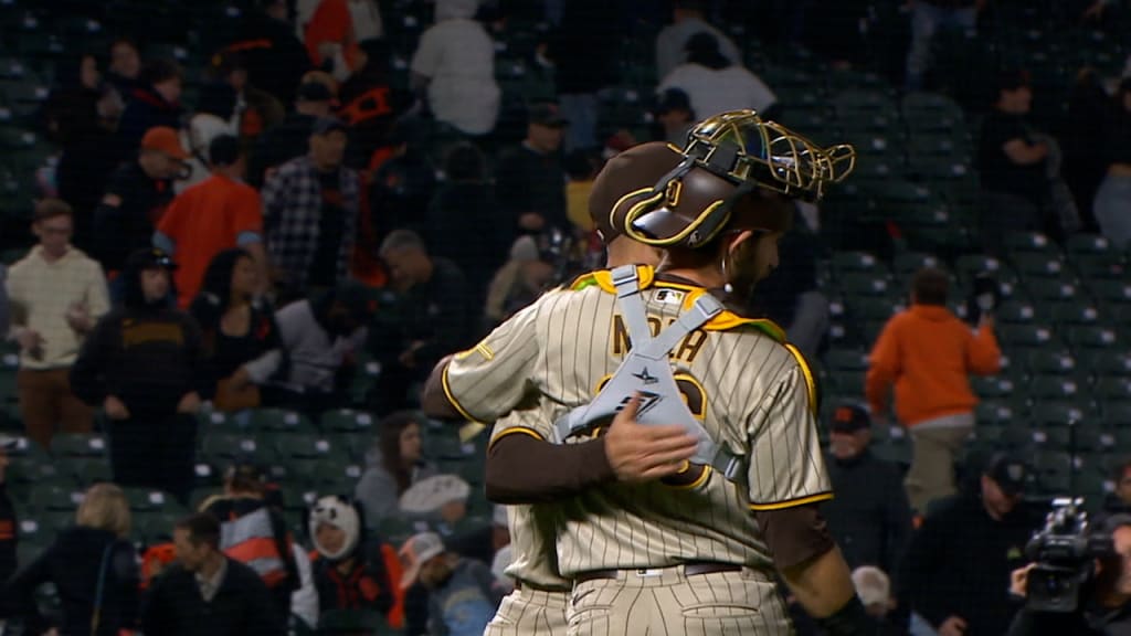 San Diego Padres relief pitcher Nick Martinez, right, celebrates