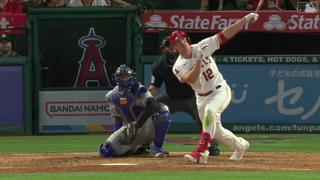 Los Angeles Angels' Mike Trout (27) gives Hunter Renfroe (12) a