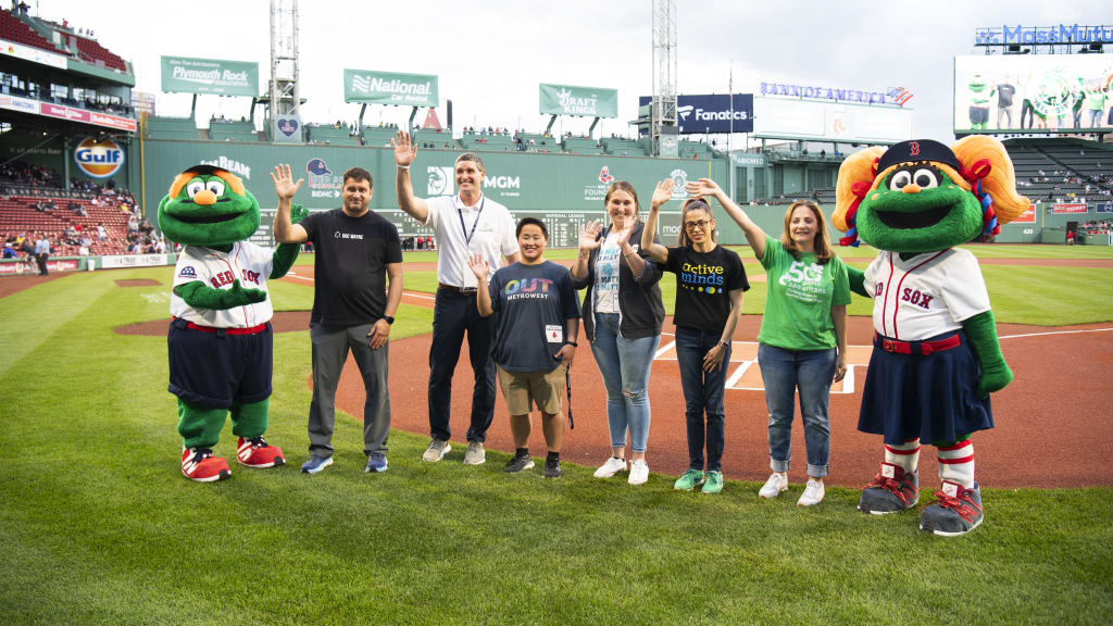 Members of the Red Sox's Changeup the Conversation initiative pose for a pregame photo.
