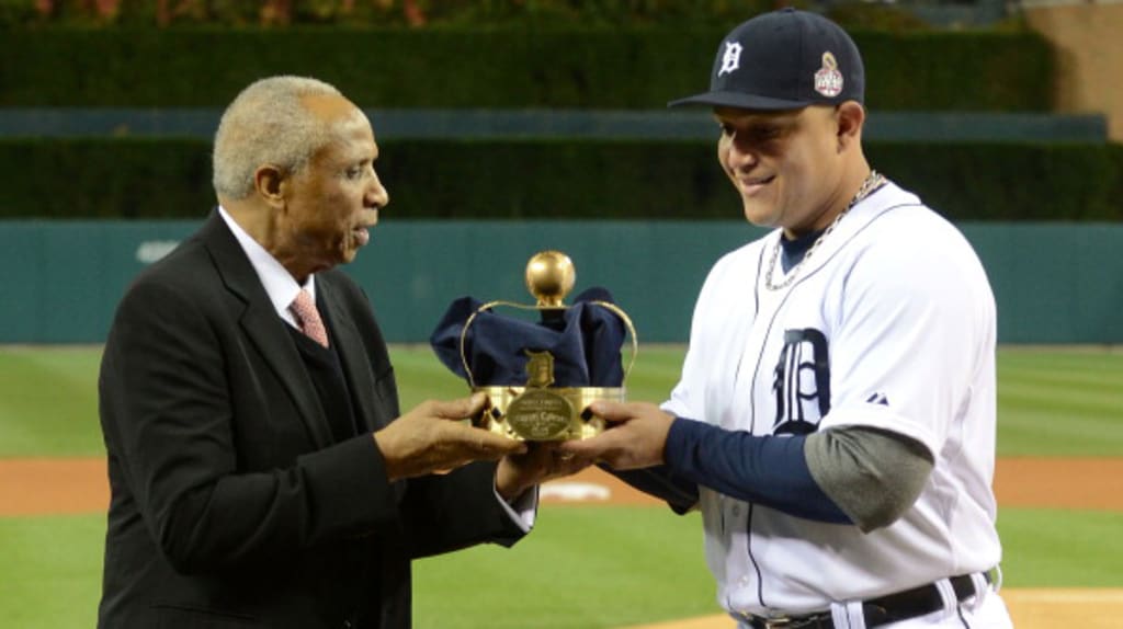 Miguel Cabrera receives his literal triple crown 