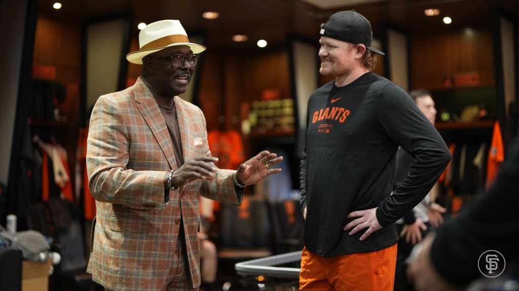 Bob Kendrick chats with Giants right-hander Logan Webb