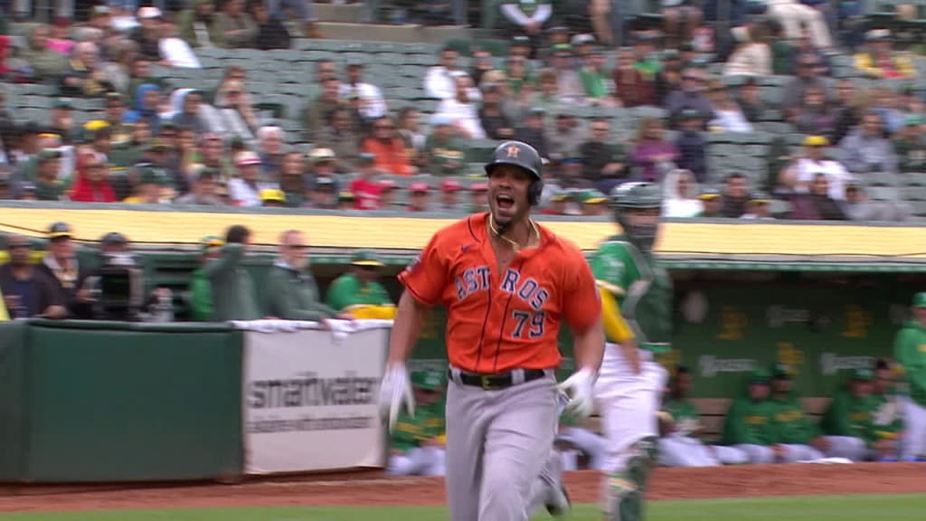 Houston Astros' Jose Abreu is congratulated by teammates after hitting a  solo home run during the third inning of a spring training baseball game  against the St. Louis Cardinals Thursday, March 2