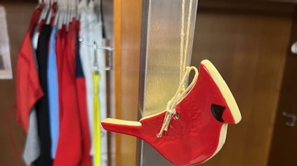 Ceramic cardinal in Sonny Gray's locker honoring his father