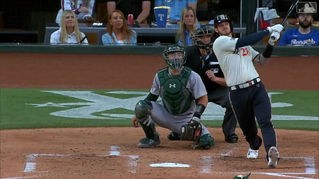 Texas starter Gray leaves after comebacker hits right elbow