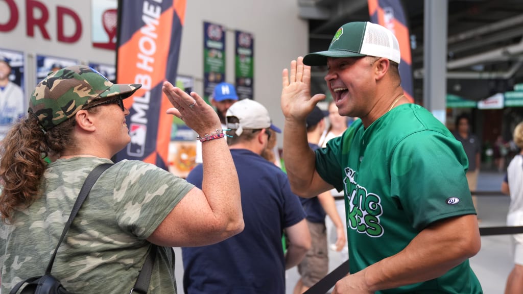 Nick Swisher greets fans as they enter Dunkin' Park