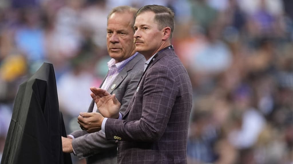 Dick and Walker Monfort will lead the Rockies' search for a new baseball operations leader. (AP)