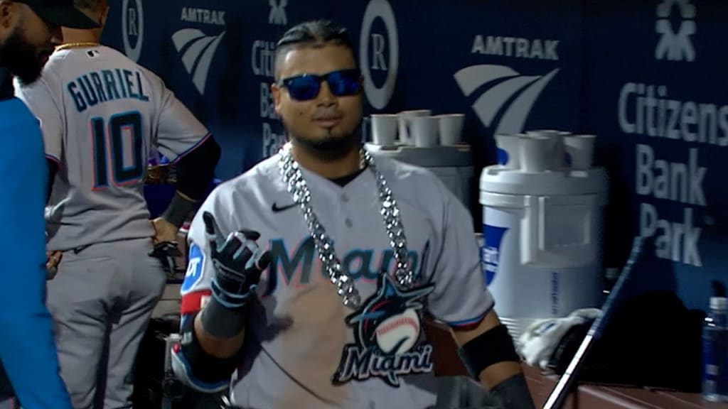 Miami Marlins Luis Arraez (3) with first base coach Jon Jay (11