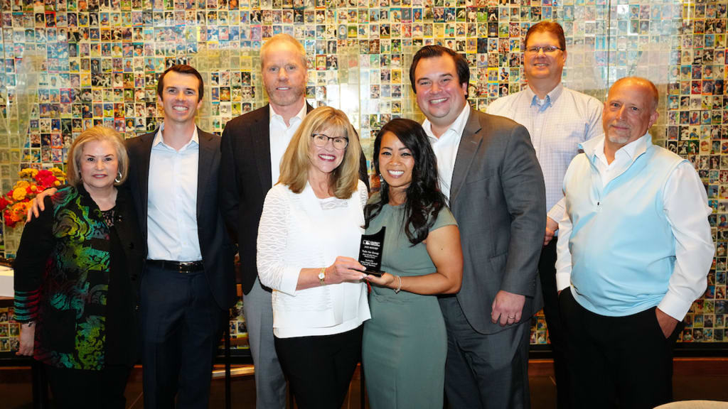 Participants pose for a photo with their award during the Diverse Business Partner Luncheon.