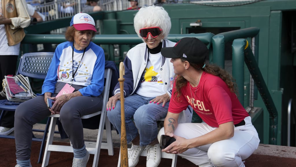 Jeneane Lesko and Maybelle Blair speak with a participant at the WPBL tryouts at Nationals Park.