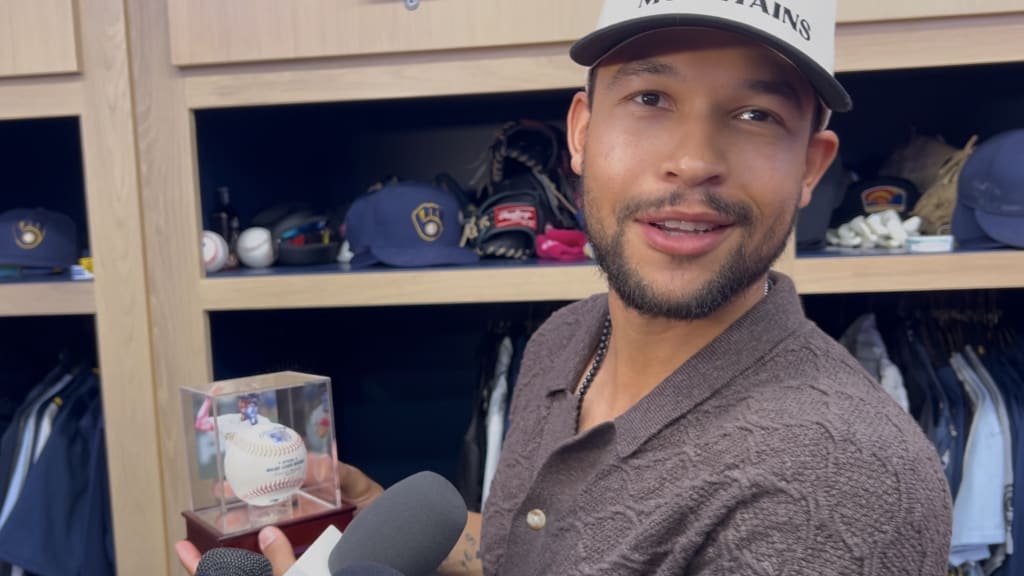 Blake Perkins with the authenticated baseball from his key single in his first Mother's Day game since the passing of his mom, Carisa Sharrett