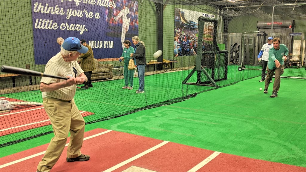 Former big leaguer Ross Ohlendorf throws a pitch during a "Baseball Memories" session.