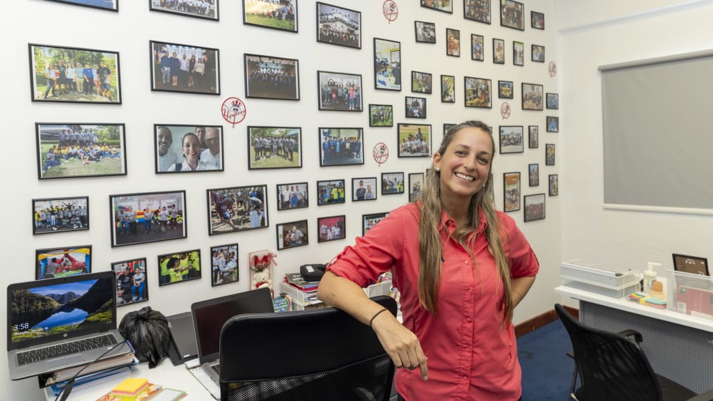 Hernandez runs the education side of the Yankees’ Latin Béisbol Academy, and she makes it a point to celebrate the achievements of the promising yet extremely young players who come through the system. “I treat them the way that I expect people to treat my boys,” says the mother of three. “If I don’t care, who’s going to care for these guys?” (Photo Credit: New York Yankees)