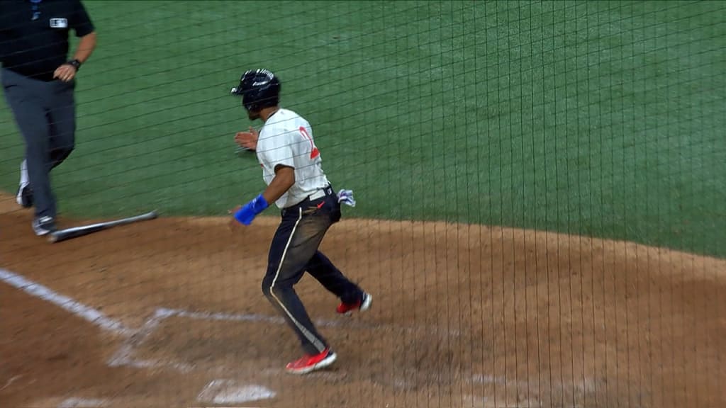 Texas Rangers' Nathaniel Lowe runs the bases after hitting a solo home run  during the fourth inning of a baseball game against the Cleveland Guardians  in Arlington, Texas, Friday, July 14, 2023. (