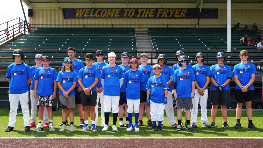 Participants pose for a team photo during the local Pitch Hit & Run and Jr. Home Run Derby regional competitions. (Photo by Mary DeCicco/MLB Photos)