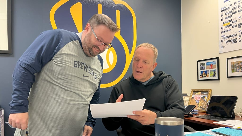 Brewers senior manager of media relations Andrew Gruman with manager Pat Murphy.