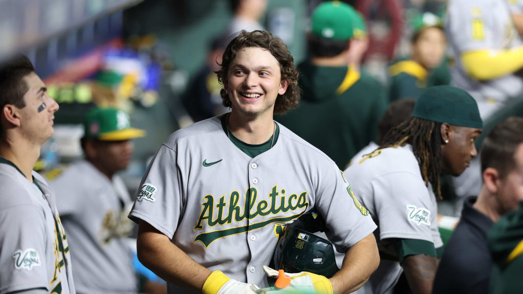 Nick Kurtz smiles in the dugout during his four homer game in Houston