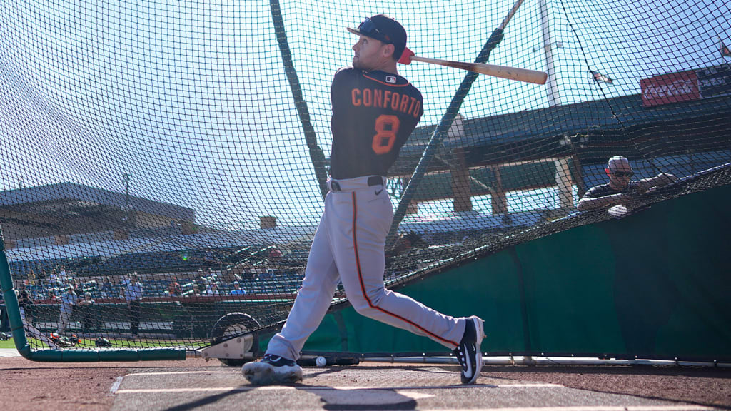 Giants newcomer Michael Conforto takes batting practice during Spring Training workouts at Scottsdale, Ariz.