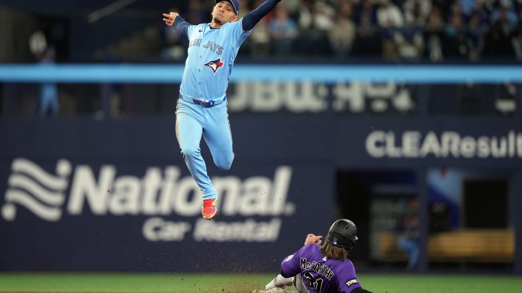 Running Rockies rally to clinch series victory