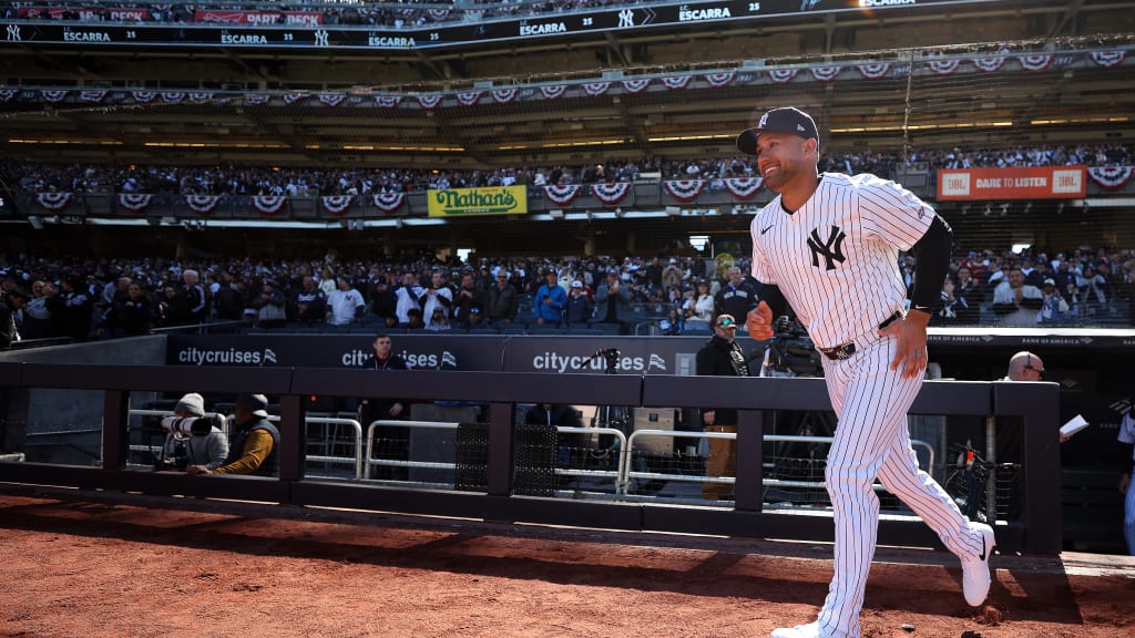 A smile is the default expression on Opening Day, but Escarra wore a particularly bright one on March 27. After a long and winding journey through myriad Minor and Independent Leagues, the catcher was finally a big leaguer, and he made sure to soak in every sight, sound and moment. (Photo credit: New York Yankees)