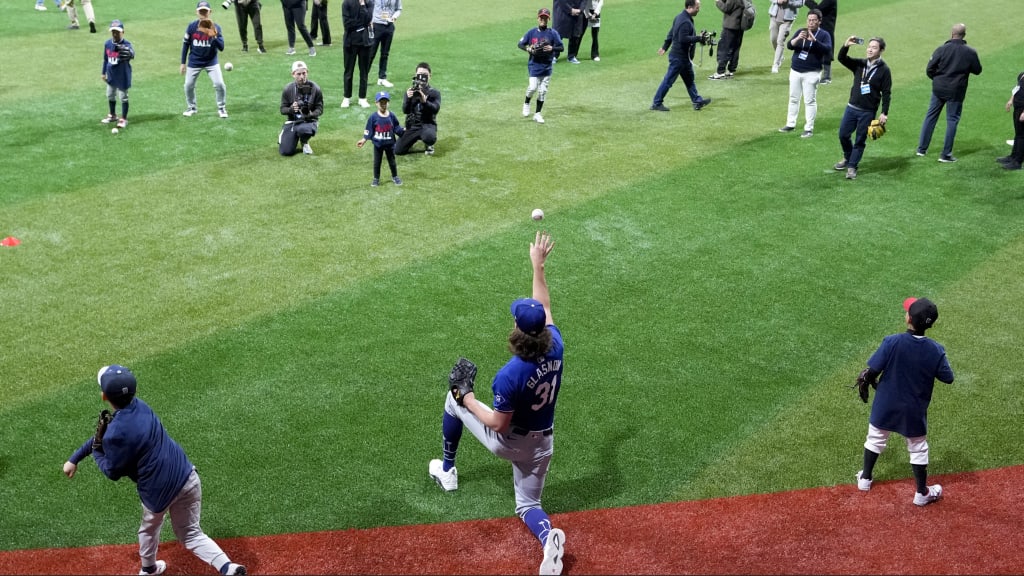 Tyler Glasnow tosses a ball during a skills clinic with local players at Gocheok Sky Dome. (AP Photo)