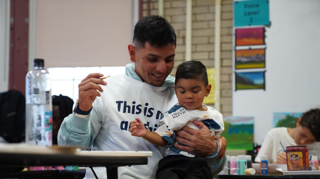 Andrés Giménez and his son
