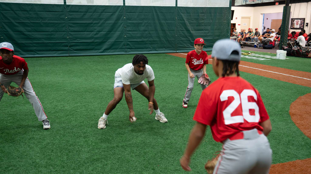 Kyle Henley and Bernard Moon worked with the young players on fielding drills.