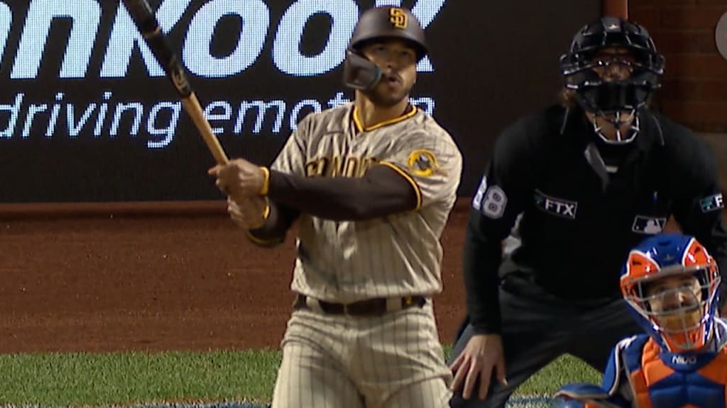 Trent Grisham San Diego Padres baseball player flipping someone