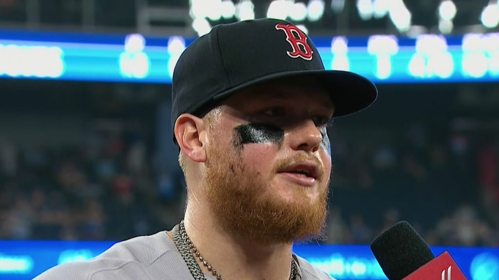 A detail shot of the necklace worn by Alex Verdugo of the Boston