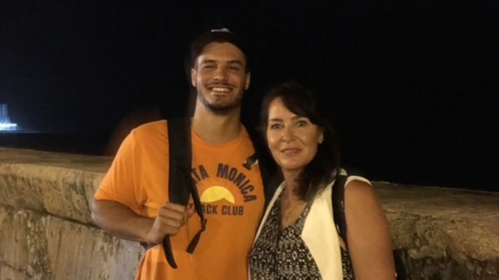 Nolan Arenado's mother, Millie, gave him his passion for baseball