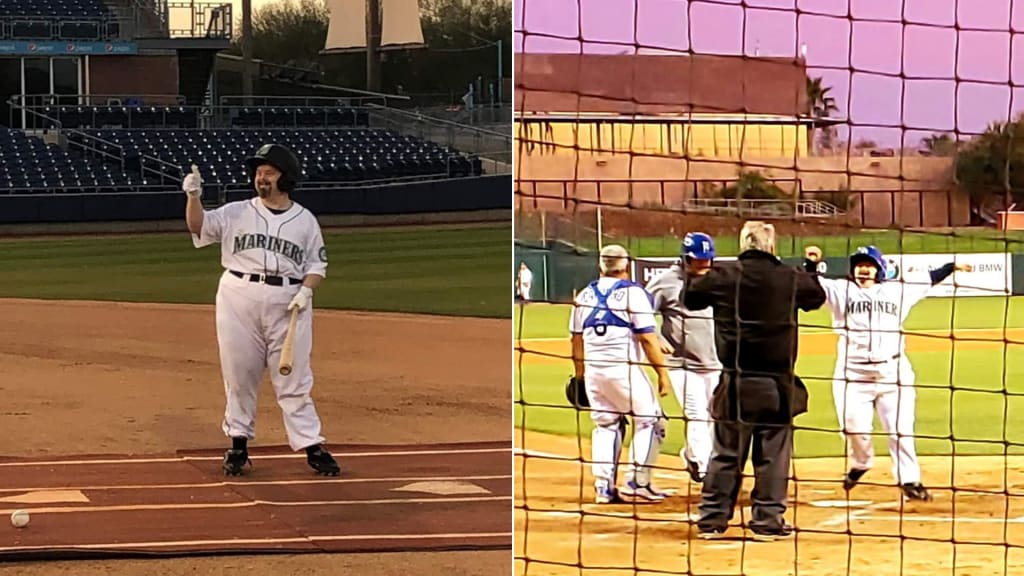 Derrick Otto celebrates after a hit in Mariners Fantasy Camp.