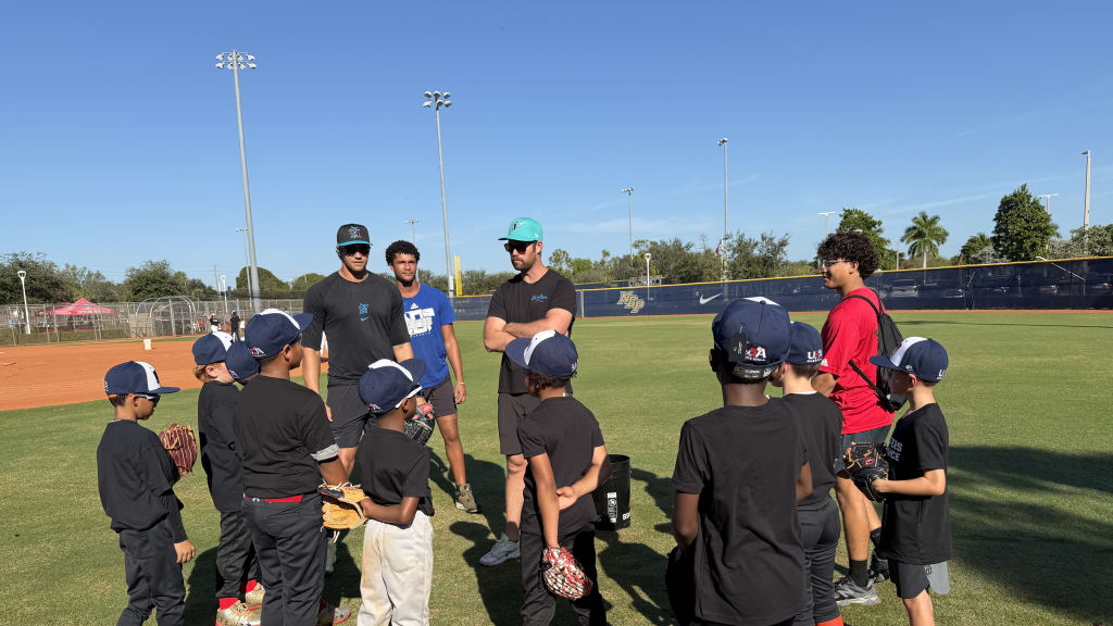 Kids at the XE9 youth baseball camp learn from the pros, including Tyler Phillips and Anthony Bender.