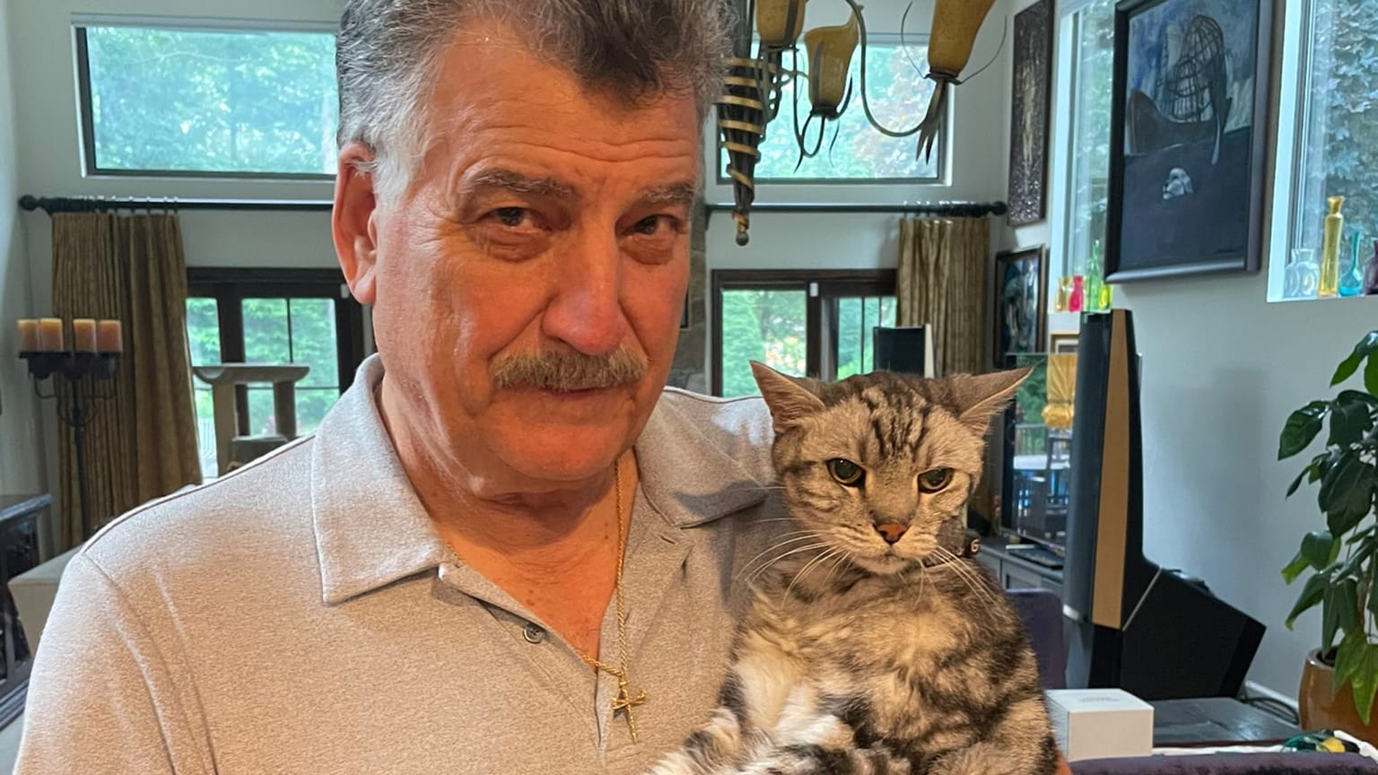 Keith Hernandez with his cat Hadji